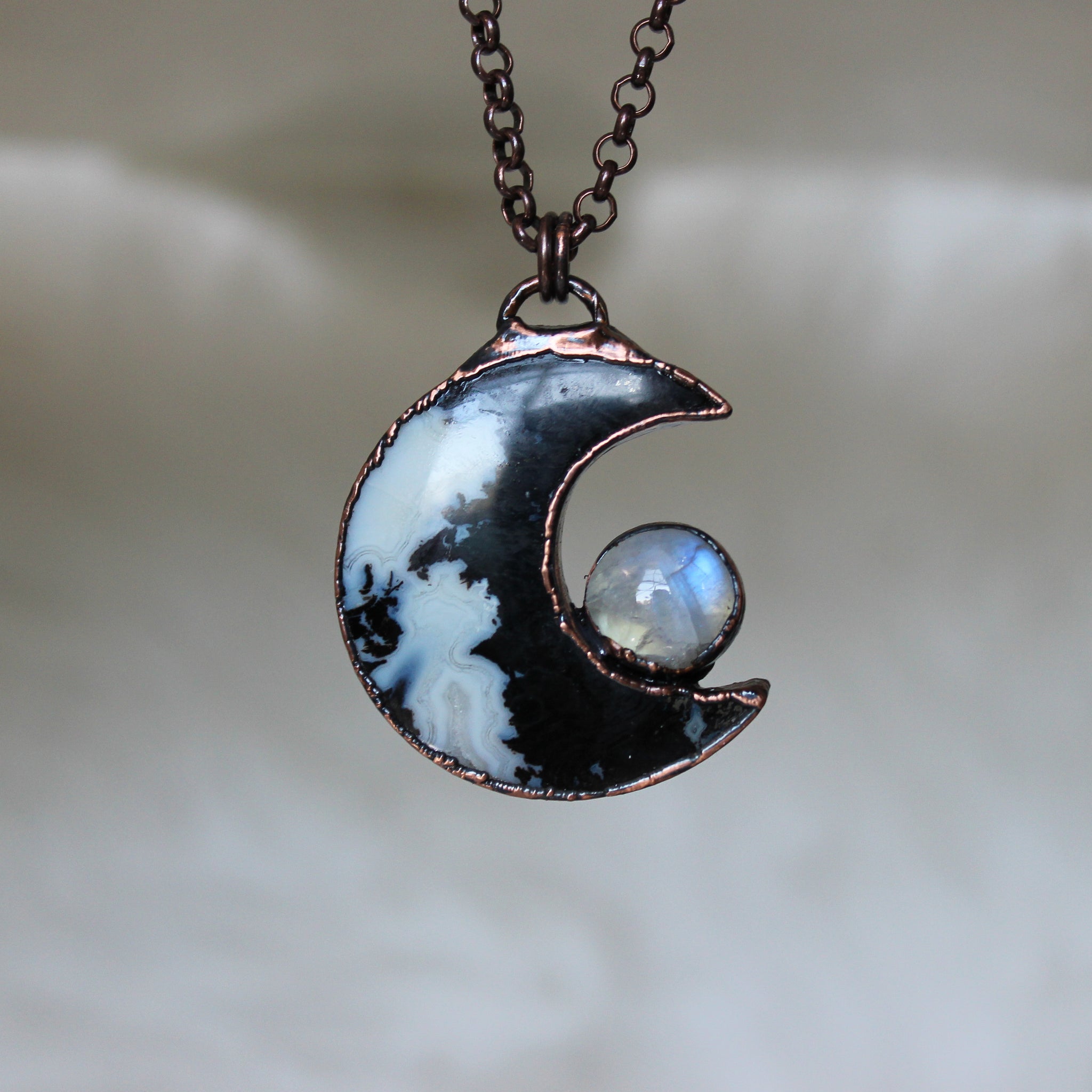 Fossilized Palm Root Moon with Moonstone