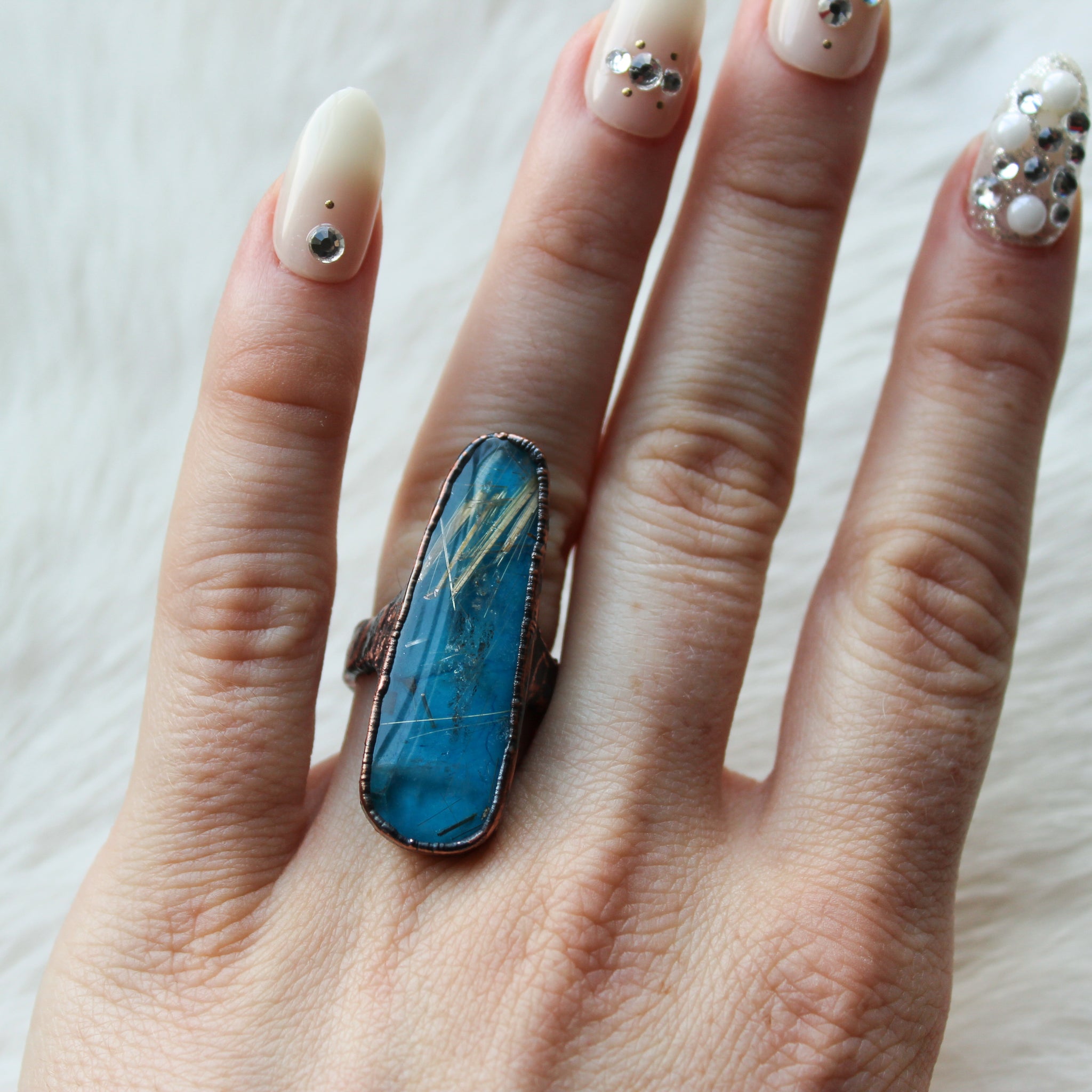 Turquoise ring with Golden Rutile Top size 6